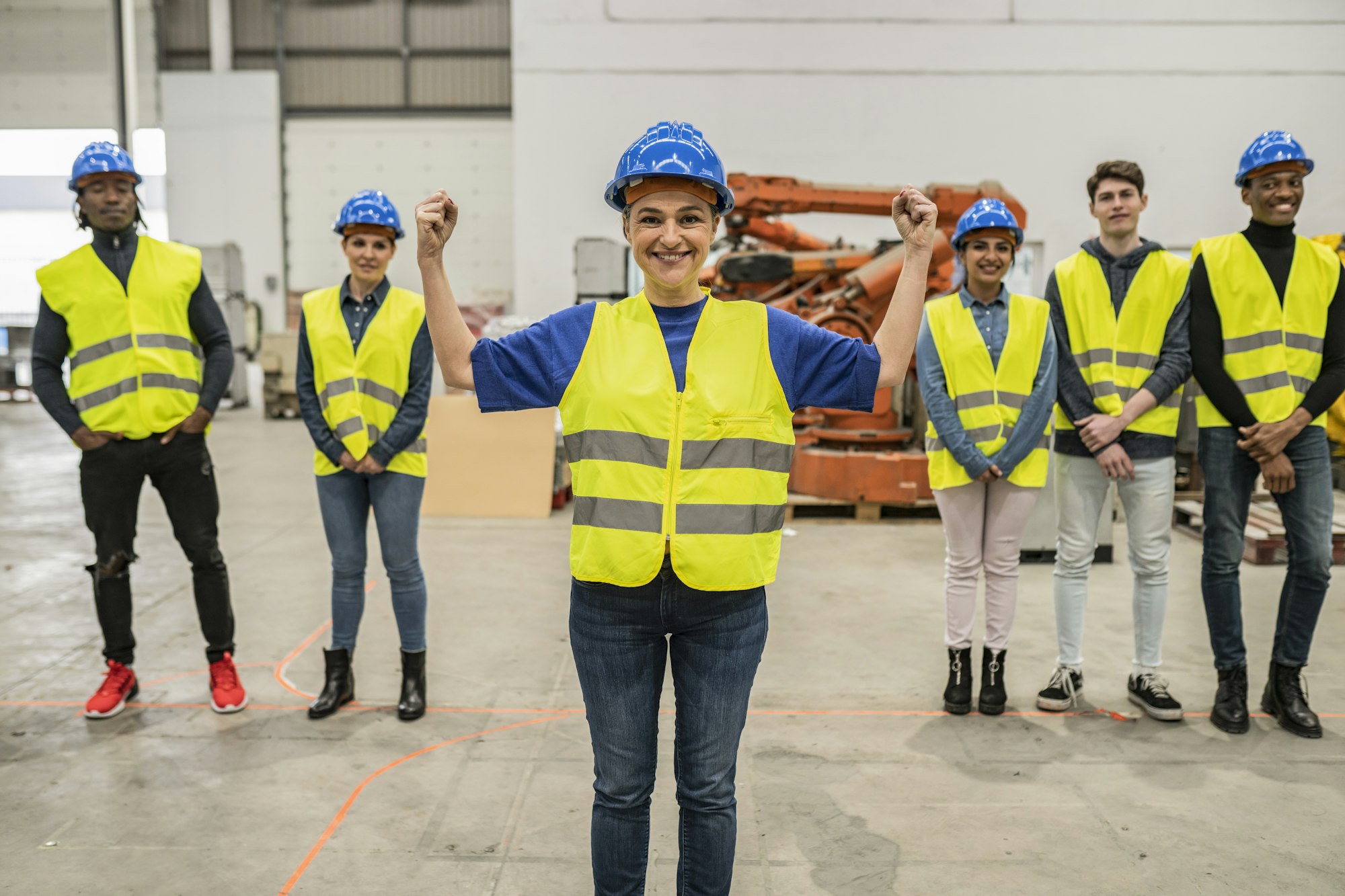 Confident Female Engineer Leading Team